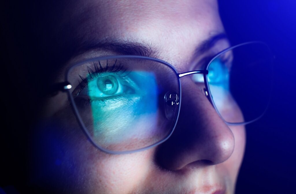 The computer screen reflecting off a person's Neurolens eyeglasses.