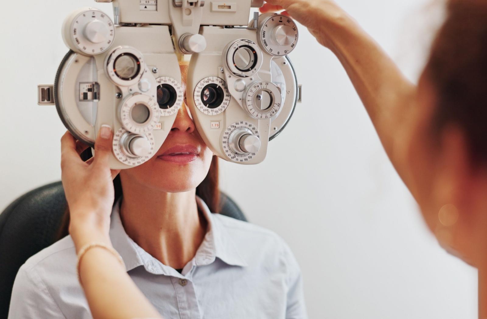 A person having their eyes examined for astigmatism.